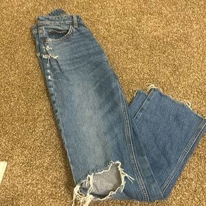 h&m straight leg dark wash ripped jeans.